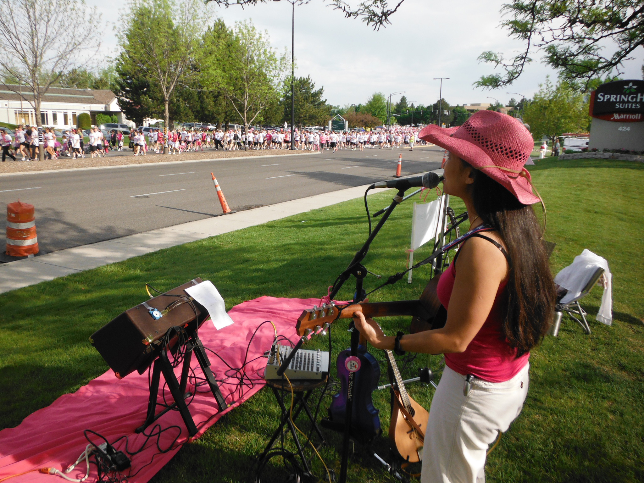 Chickadee plays for the 2013 Race for the Cure participants.